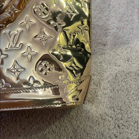 Louis Vuitton Gold Shoulder Bag with Iconic Monogram